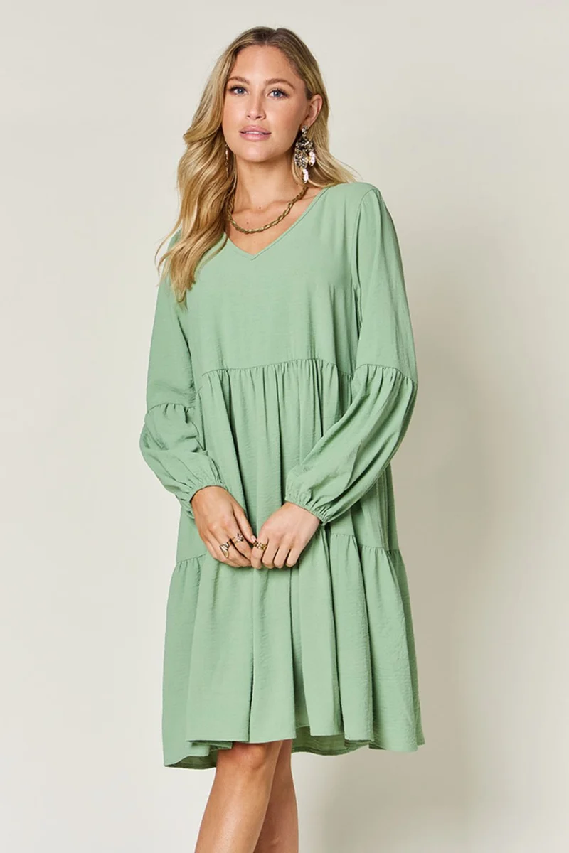 Robe à volants et manches ballon à col en V avec poches