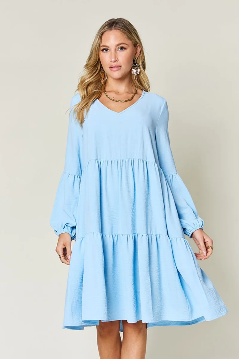 Robe à volants et manches ballon à col en V avec poches
