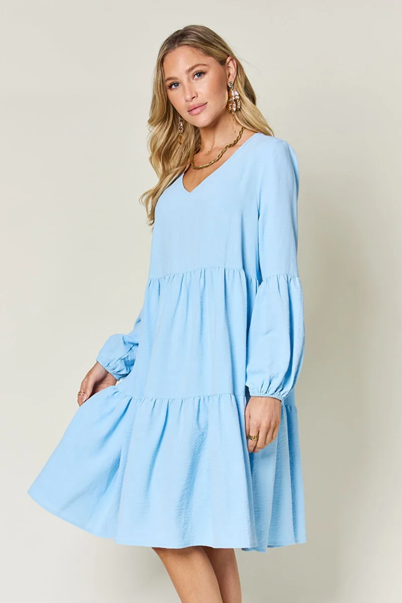 Robe à volants et manches ballon à col en V avec poches
