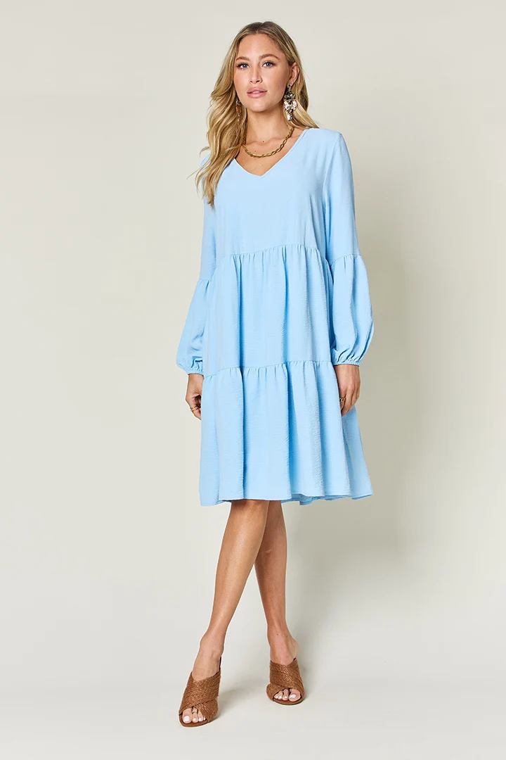 Robe à volants et manches ballon à col en V avec poches