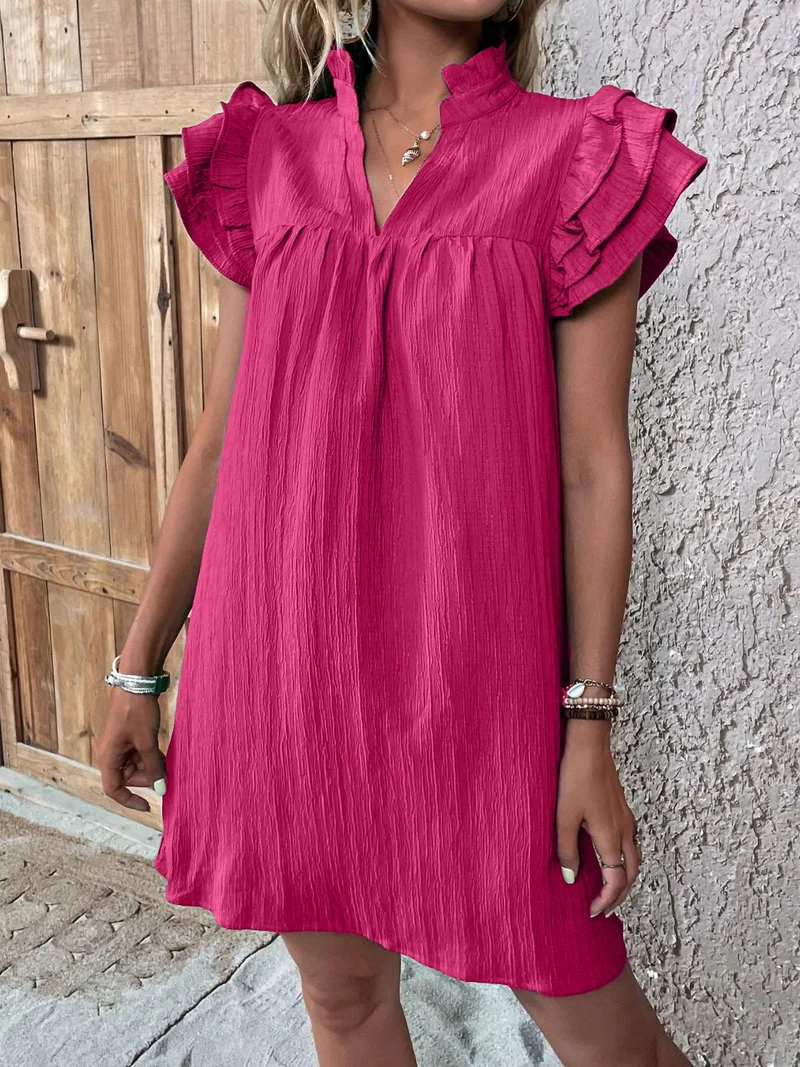 Mini-robe à volants et manches courtes crantées