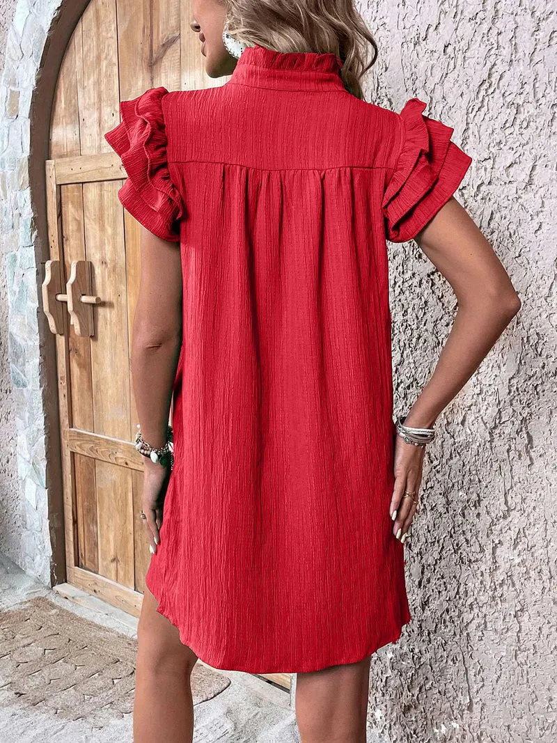 Mini-robe à volants et manches courtes crantées