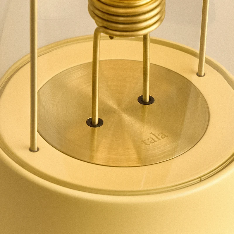 The Muse 2.0 Portable Lamp in Posset Yellow